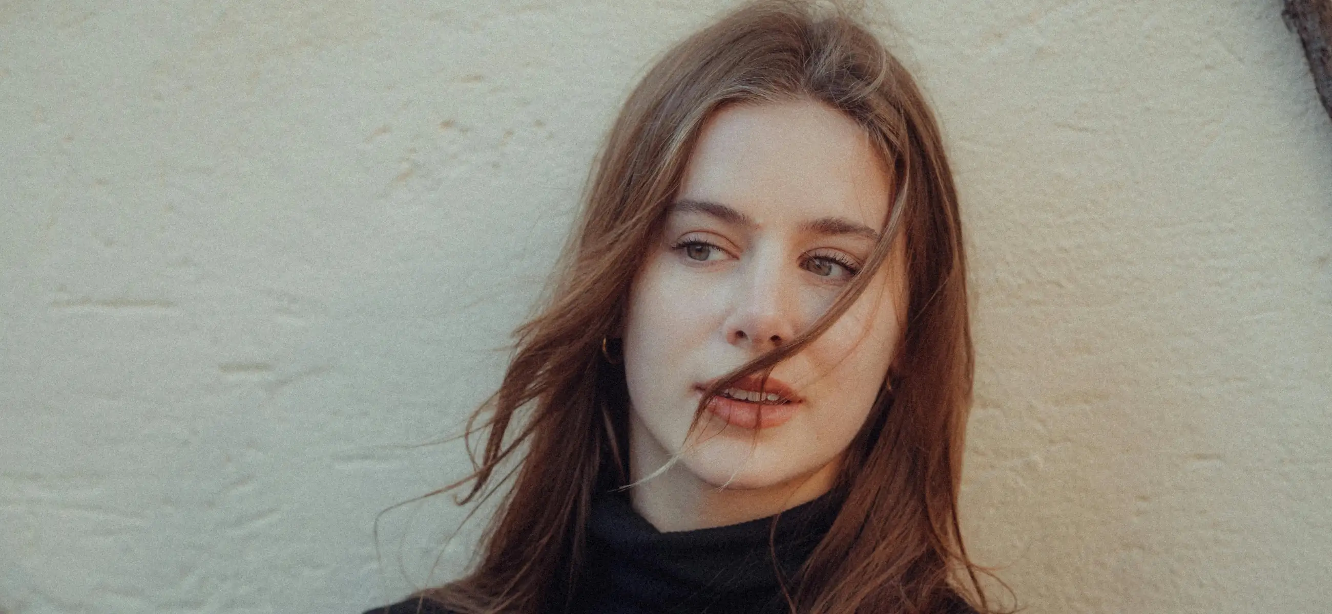 7 easy hairstyles for long hair, from the formal updo to wispy curtain bangs