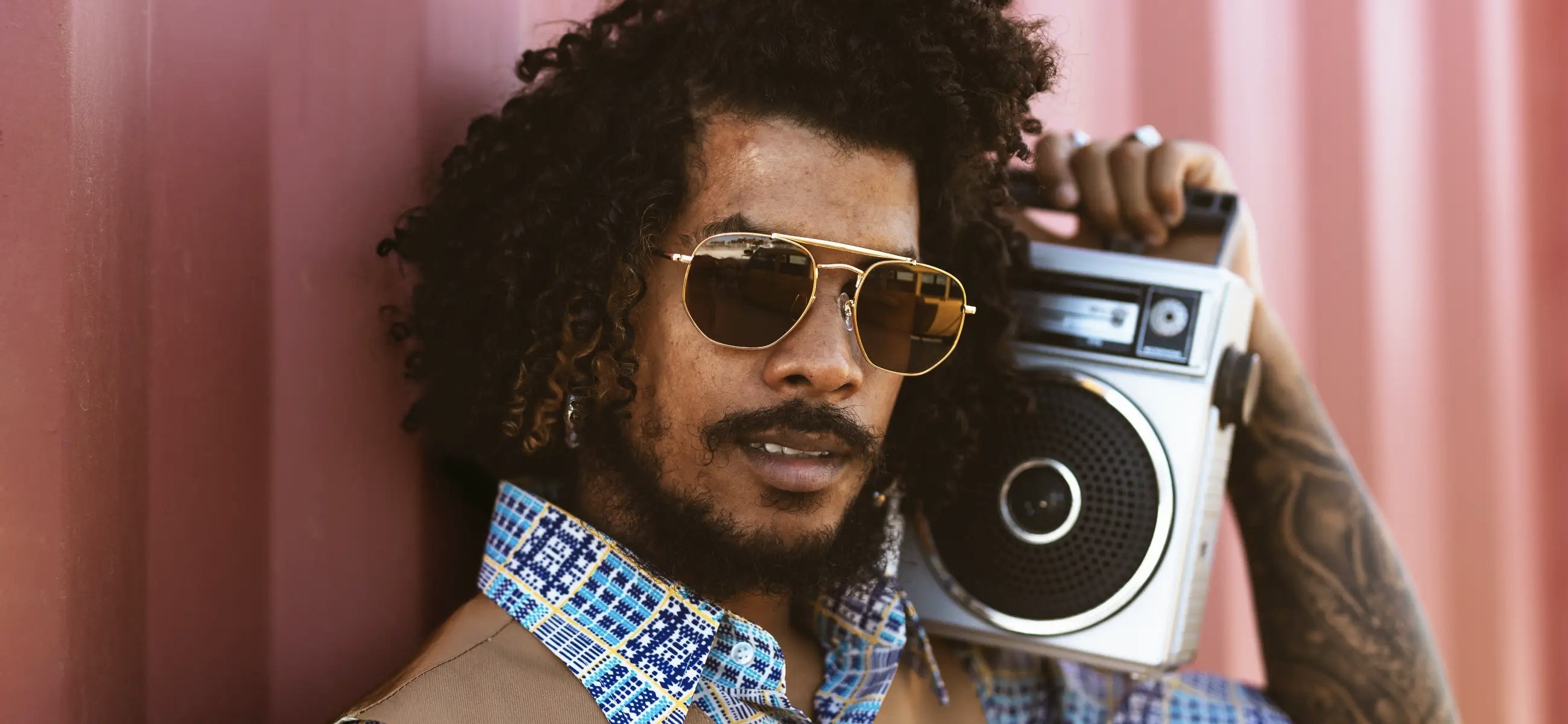15 men's hairstyles from the 1980s to try in 2025