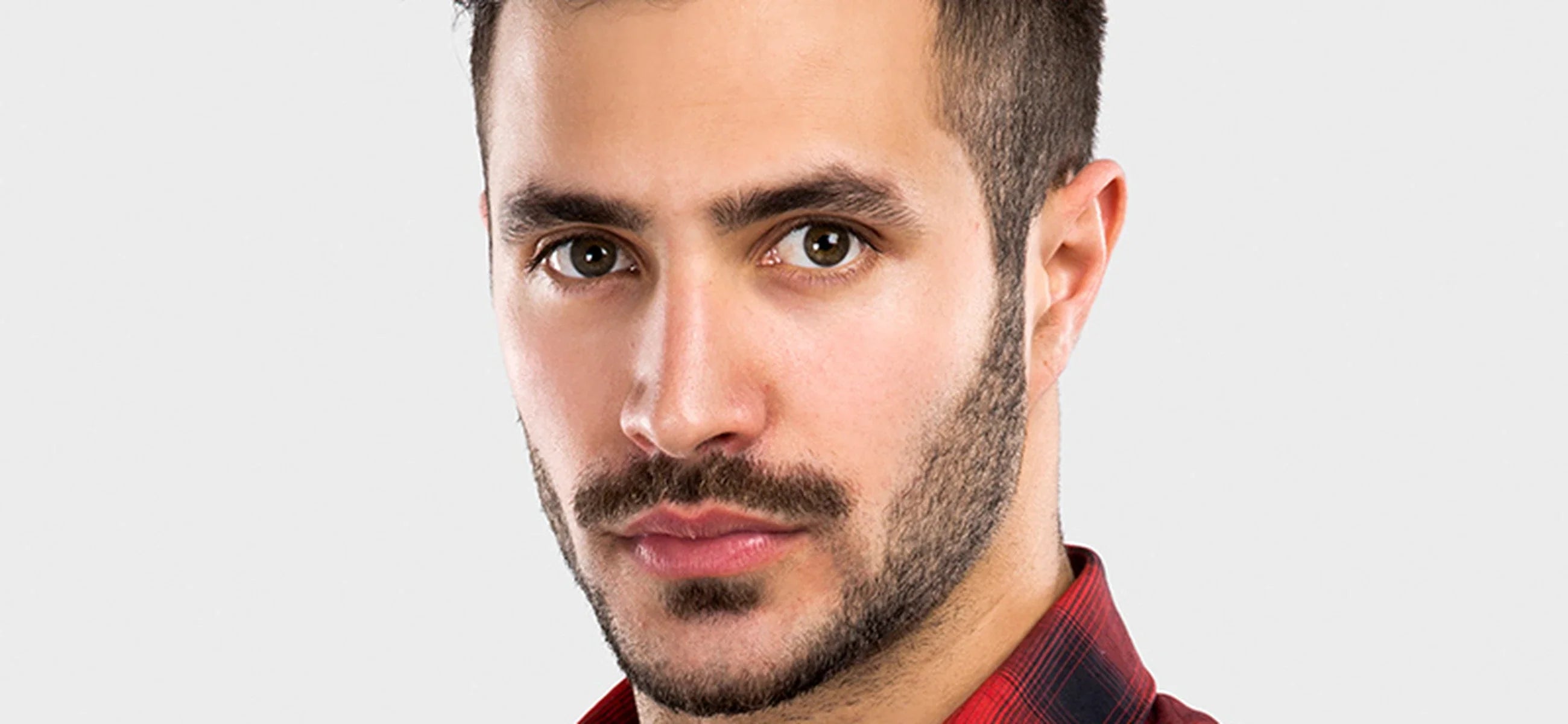 Soul patch beneath the lower lip paired with a mustache and surrounding beard