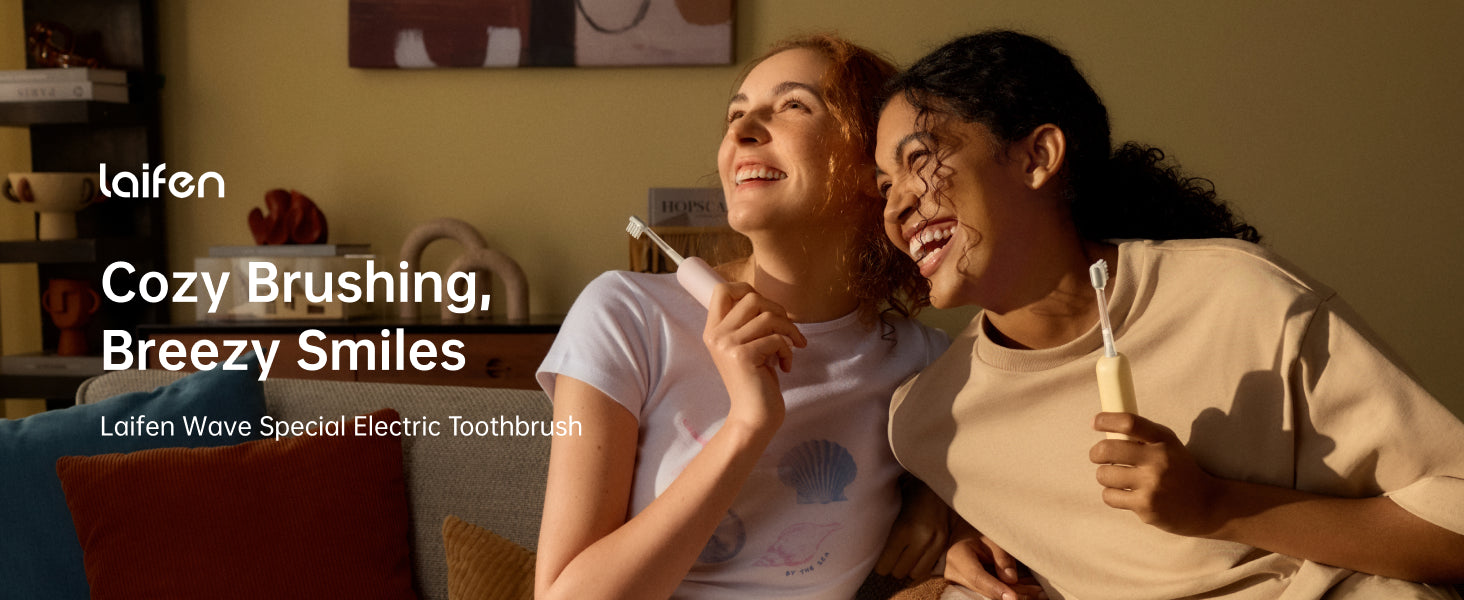 Two people sitting together holding electric toothbrushes with 'Laifen' branding.