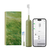 Laifen electric toothbrush in an olive green color, shown alongside its matching textured green and white box, a spare brush head, and a smartphone displaying its companion app interface.